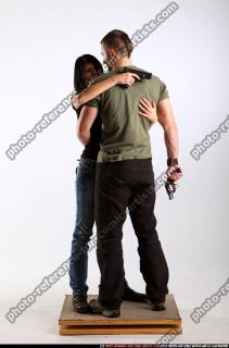 Aideen-hugging-guns
