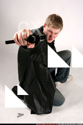 JANISONE KNEELING AIMING2 00