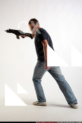 Man Adult Average White Fighting with submachine gun Standing poses Sportswear