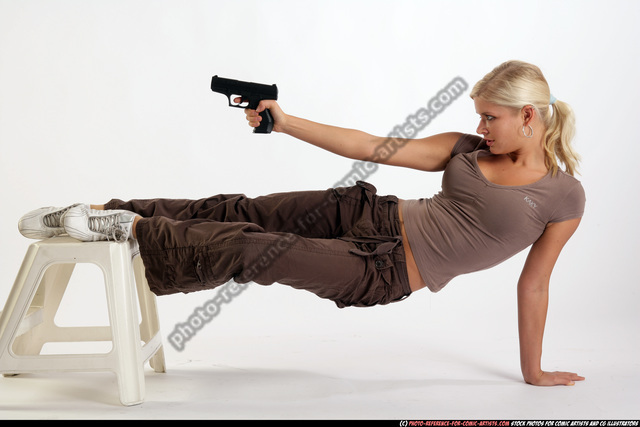 Young Fit Female Fighter Posing Combat Poses Stock Photo by ©april_89  4749190