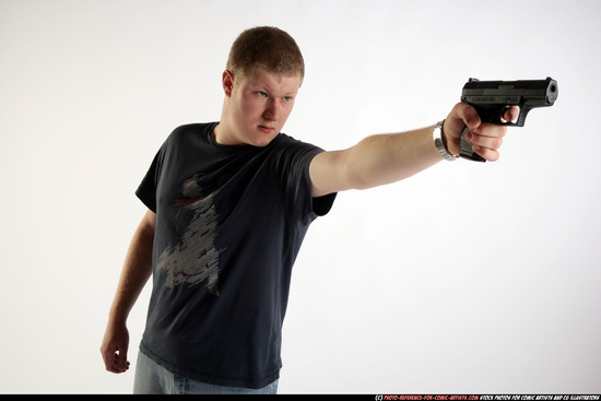 Man Adult Average White Fighting with gun Standing poses Sportswear