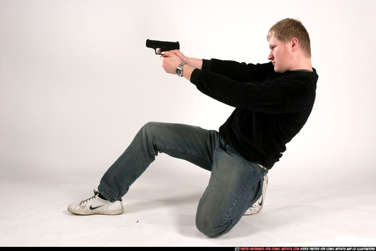 Man Adult Average White Fighting with gun Kneeling poses Sportswear