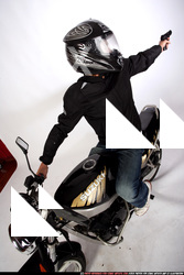 JANISONE BIKER SHOOTING BACK PISTOL 05.JPG