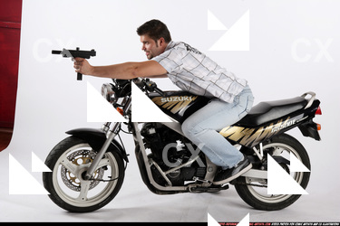 ROSTISLAV BIKER SHOOTING FRONT UZI 09.JPG