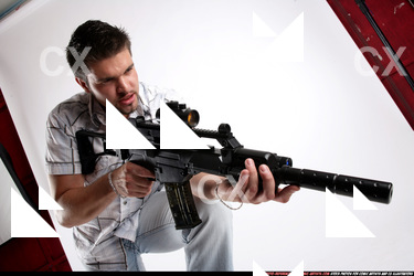 JANISONE MERCENARY STANDING ON CHAIR AIMING HK 05.JPG