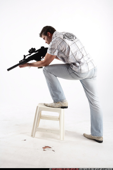 Man Adult Average White Fighting with submachine gun Standing poses Casual