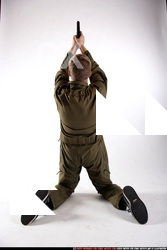 Man Young Average White Fighting with gun Kneeling poses Army