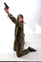 JANISONE KNEELING SHOOTING UP PISTOL 07 A.jpg