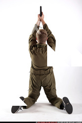 Man Young Average White Fighting with gun Kneeling poses Army