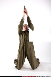Man Young Average White Fighting with gun Kneeling poses Army