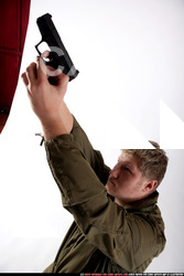 Man Young Average White Fighting with gun Kneeling poses Army