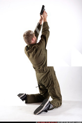 JANISONE KNEELING SHOOTING UP PISTOL 03 A.jpg