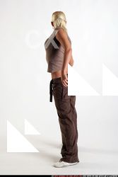 Woman Young Athletic White Fighting with gun Standing poses Sportswear