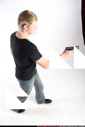 Man Adult Average White Fighting with gun Standing poses Sportswear