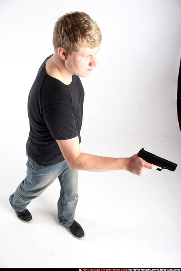 Man Adult Average White Fighting with gun Standing poses Sportswear