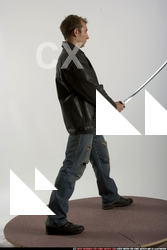 Adult Muscular White Fighting with sword Standing poses Sportswear