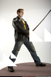 Adult Muscular White Fighting with sword Standing poses Sportswear