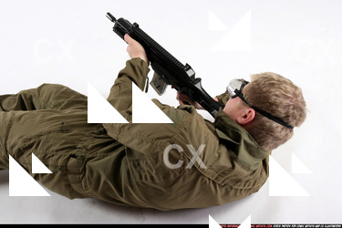 Man Adult Average White Fighting with submachine gun Laying poses Army