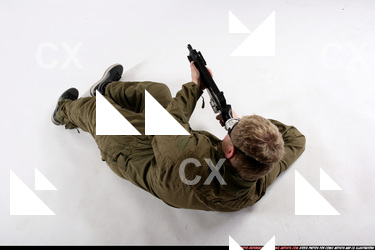 Man Adult Average White Fighting with submachine gun Laying poses Army