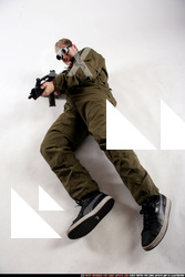 Man Adult Average White Fighting with submachine gun Laying poses Army