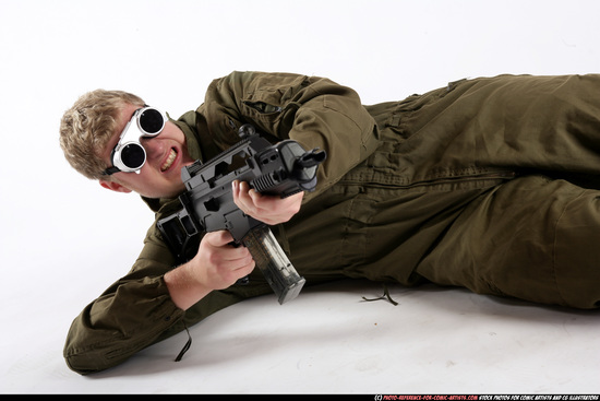Man Adult Average White Fighting with submachine gun Laying poses Army