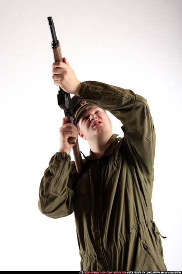 Man Young Average White Fighting with submachine gun Standing poses Army