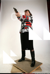 Woman Old Average White Fighting with gun Standing poses Casual