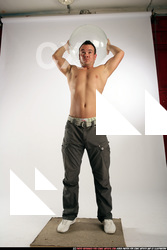 Man Adult Athletic White Throwing Standing poses Pants