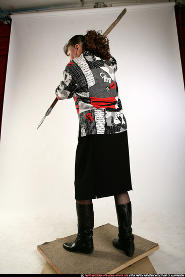 Woman Old Average White Fighting with spear Standing poses Casual