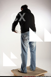 Man Adult Average Black Holding Sitting poses Sportswear