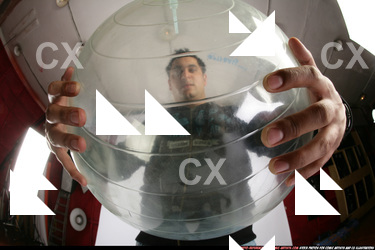 Man Adult Average Black Holding Sitting poses Sportswear