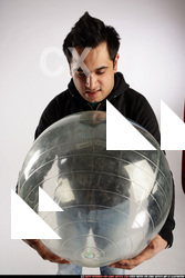 Man Adult Average Black Holding Sitting poses Sportswear