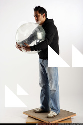 Man Adult Average Black Holding Sitting poses Sportswear