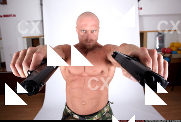 2009 08 DEON DUAL PISTOLS POSE1 04.JPG