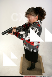 2009 08 PAULA STANDING AIMING PISTOL LIGHT 06 A.jpg
