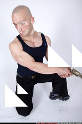 2009 08 RAFAEL KNEELING PISTOL POSES 02.jpg