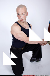 2009 08 RAFAEL KNEELING PISTOL POSES 03.jpg