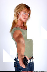 Woman Adult Muscular White Fighting with gun Standing poses Sportswear