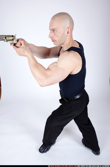 Man Adult Muscular White Fighting with gun Standing poses Sportswear