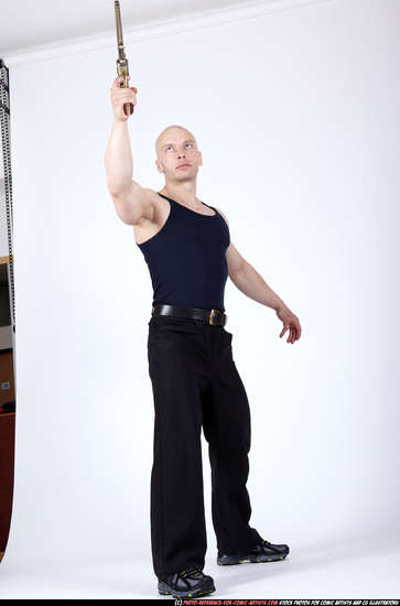 Man Adult Muscular White Fighting with gun Standing poses Sportswear