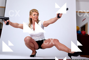 2009 10 JANETTE DUAL PISTOLS POSE1 06.jpg