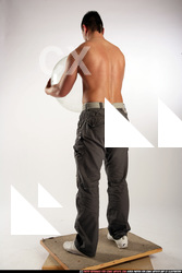 Man Adult Athletic White Daily activities Standing poses Pants
