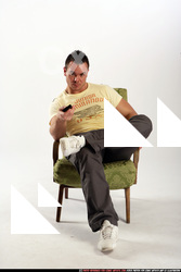 Man Adult Athletic White Daily activities Sitting poses Sportswear