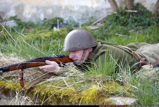 Man Adult Average White Fighting with rifle Laying poses Army
