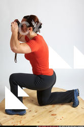 2010 06 ANGELINA KNEELING WATCHING BINOCULARS 02 A.JPG