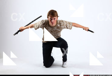 2010 08 PATRICK KNEELING DUAL KATANA 00