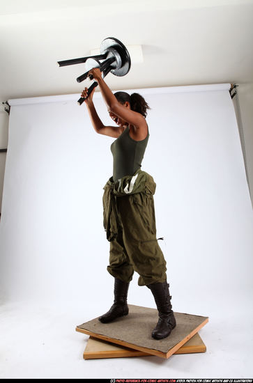 Woman Young Athletic Black Throwing Standing poses Army