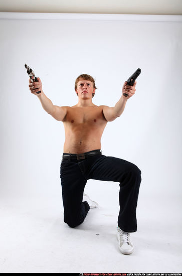 Man Young Athletic White Fighting with gun Kneeling poses Pants