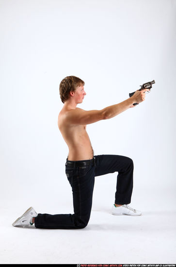 Man Young Athletic White Fighting with gun Kneeling poses Pants