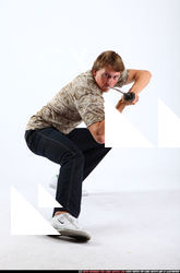 2010 10 PATRICK KNEELING KATANA DEFEND POSE 06.jpg